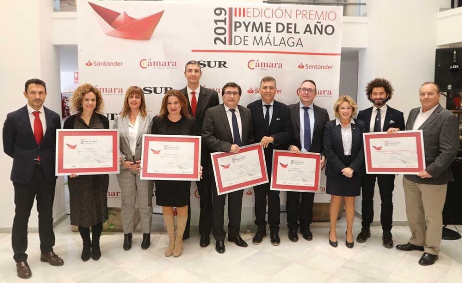 Ganadores y organizadores.